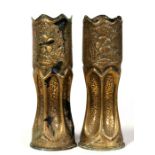 A pair of WWI trench art vases, 29cms (11.5ins) high (2).