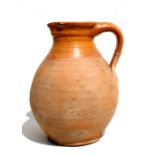 A Verwood pottery jug, 35cms (13.75ins) high.