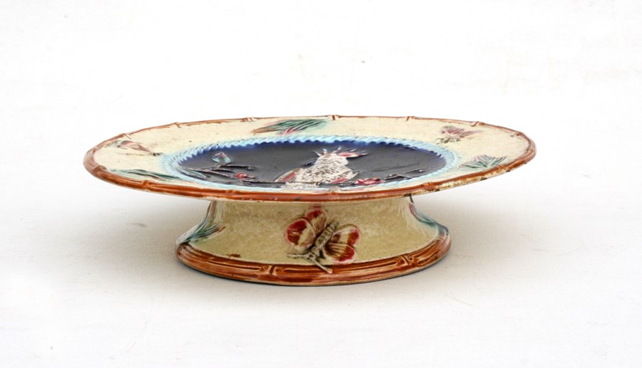 A 19th century majolica comport with central cockatoo decoration, 23cms (9ins) diameter. - Image 2 of 2