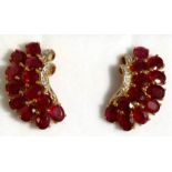A pair of 9ct gold ruby and diamond cluster earrings