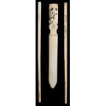 An early 20th century Chinese ivory letter opener decorated with horses and calligraphy; together