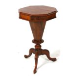 A Victorian walnut trumpet work or sewing box, on tripod base, 44cms (17.25ins) wide.