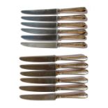 A set of six silver handled dinner knives, Sheffield 1891; together with a matching set of six