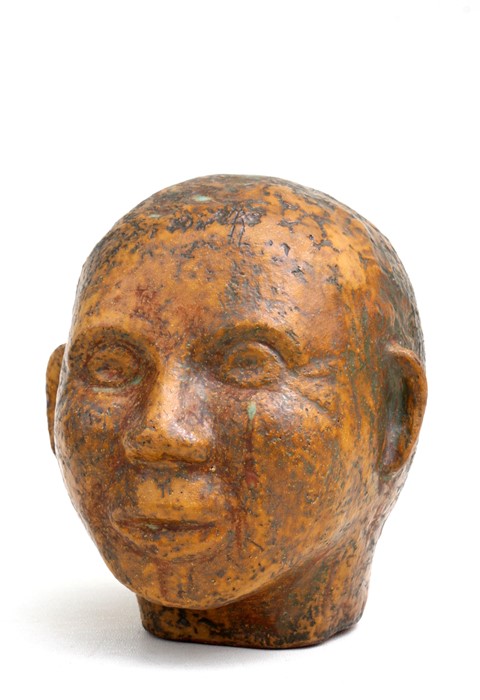 A Studio Pottery terracotta head of a man, 20cms (8ins) high.