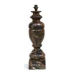 A large turned figured brown marble table lamp, 49cms (19.75ins) high.
