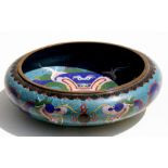 A large Chinese cloisonne shallow bowl decorated with scrolling dragons chasing a flaming pearl,