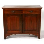 A late 19th century walnut sideboard with two frieze drawers above cupboards, 107cms (42ins) wide.