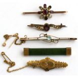 A group of five Victorian and later bar brooches.