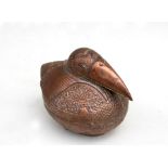 A Cambodian copper betal nut / leaf box in the form of a bird, decorated with foliate scrolls with