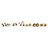 Seven pairs of 9ct and 14ct gold earrings.