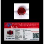 A natural ruby loose gemstone with GGL certificate report stating the ruby to be 8.10cts, oval cut