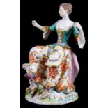 A 19th century English porcelain group of a young girl with a sheep, with gold anchor mark to the