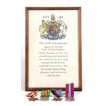 A framed and glazed WW2 Commemorative Scroll named to Sapper JE Newman of the Royal Engineers who