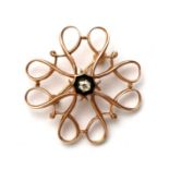 A 9ct gold & diamond brooch, 3cms (1.25ins) diameter.