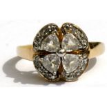A 9ct gold cluster ring set with four white stones surrounded by diamonds, approx UK size 'L'.