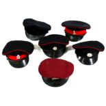 Six vintage military caps including Worcestershire Regiment, Cheshire Regiment, Royal Hussars, Royal