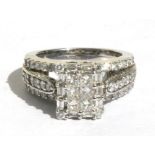 A 14ct white gold diamond ring, 2ct of square, round and baguette cut diamonds, approx UK size 'N'.