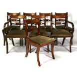 A set of eight Regency style mahogany dining chair inlaid with brass