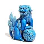 A Chinese turquoise glazed Fo dog or temple lion, 24cms (9.5ins) high.