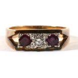 An 18ct gold ring with central diamond flanked by a pair of rubies, approx UK size 'K'.