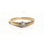 A 9ct gold diamond solitaire ring, approx UK size 'M'.