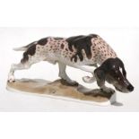 A Nymphenburg porcelain model of a Pointer on the scent, with impressed underglaze blue shield
