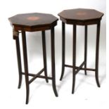 A pair of inlaid mahogany octagonal stands on square tapering legs joined by a stretcher, 39.5cms (