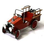 A child's pedal car fire engine, 94cms (37ins) long.