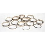 A large quantity of silver bangles, total weight 319g.