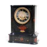 A Victorian black slate mantle clock, the black dial with Roman numerals, 29cms (11.5ins) wide.