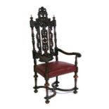 A 19th century walnut throne chair with carved and pierced splat, on turned supports joined by a