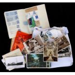 A quantity of postcards and loose stamps to include First Day covers.