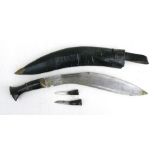 A large horn handled kukri and scabbard, overall 52cms (20.5ins) long.