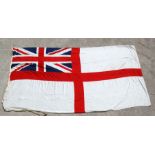 A large white ensign flag, 445 by 213cms (14ft 6 by 7ft).