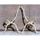 A pair of Victorian cast iron bench ends of naturalistic form.