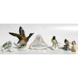 A group of Karl Ens porcelain models of birds and similar; together with a Karl Ens advertising