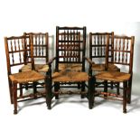 Six spindle back country dining chairs with strung seats (five chairs and one carver).