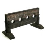 A set of oak iron bound wrist and ankle stocks, 114cms (45ins) wide.