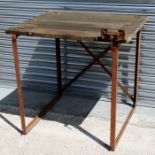 An Industrial type work bench, 89cms (35ins) wide.