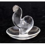 A Lalique glass pin dish modelled with a cockerel, 9cms (3.5ins) high.