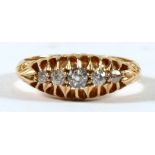 An 18ct gold five-stone diamond ring, approx UK size 'I'.