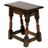 A 20th century oak joint stool, 46cms (18ins) wide.