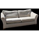 A Marks & Spencer's cream upholstered three-seater sofa, 220cms (86.5ins) wide.
