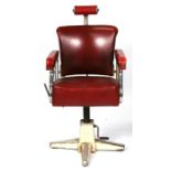 A mid 20th century La Reine 'Restocrat' barbers swivel chair on quatrefoil supports.