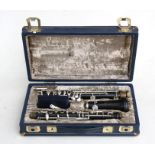 A Boosey & Hawkes Emperor three-piece oboe, cased.