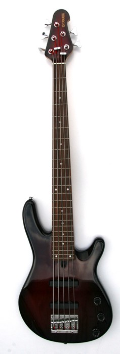 A Yamaha five string bass guitar, Model No. BB405, in soft carry case