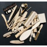 A quantity of late 19th / early 20th century ivory items, to include walking stick handles,