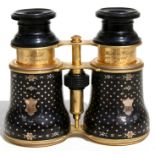 A pair of 19th century Negretti & Zambra gold inlaid tortoiseshell opera glasses.Condition Report