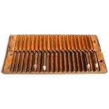 A wooden cigar mould to mould twenty cigars, 56cms (22ins) long.