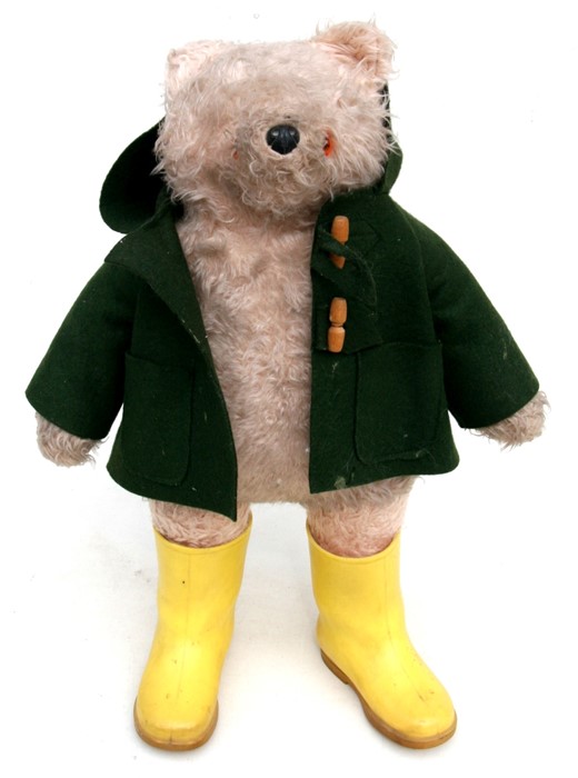 A Gabriel Designs Paddington Bear with green coat and yellow wellington boots, 53cms (21ins) high.